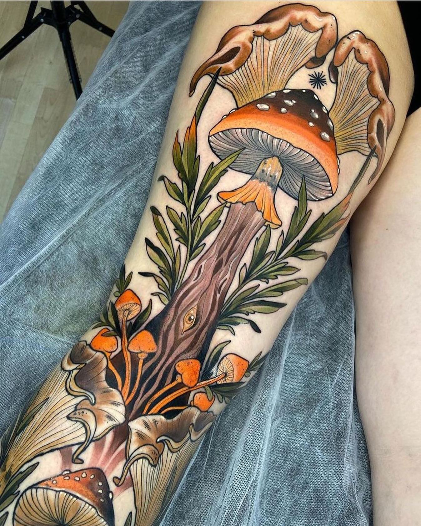 Psychedelic Mushroom Tattoo with Smiley Face and Pink Clouds mushroom tattoo ideas tattoo