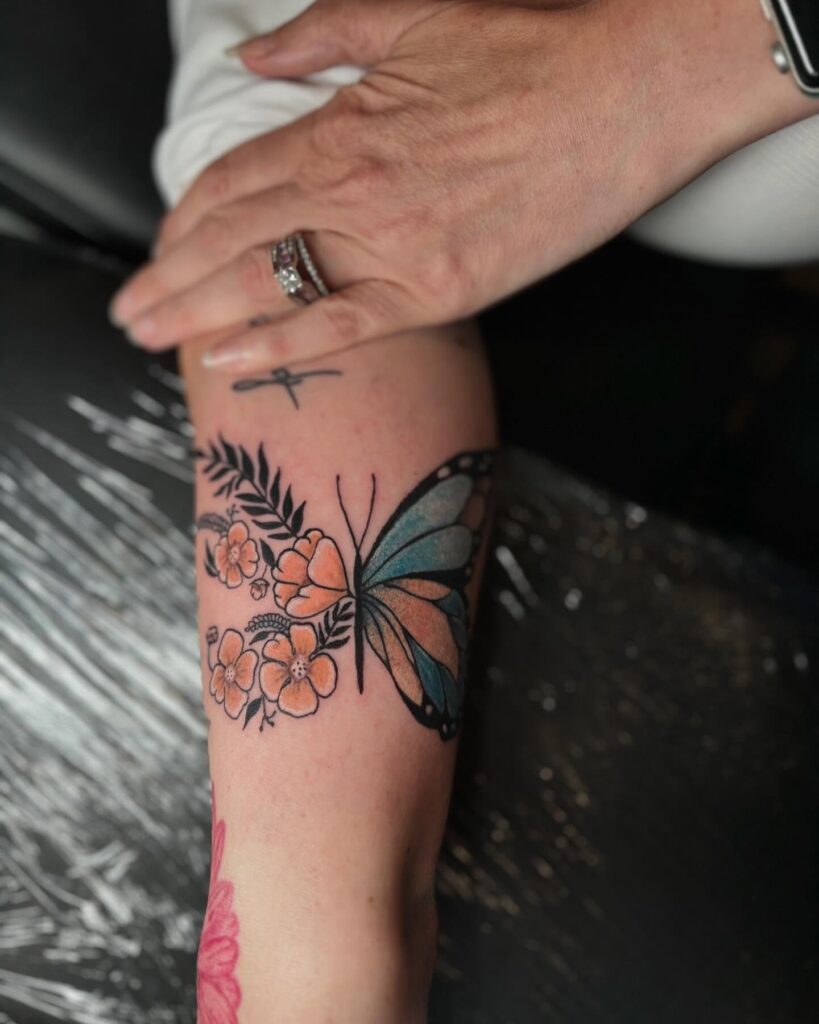Colorful Half Butterfly and Wildflower Tattoo half butterfly half flower tattoos tattoo