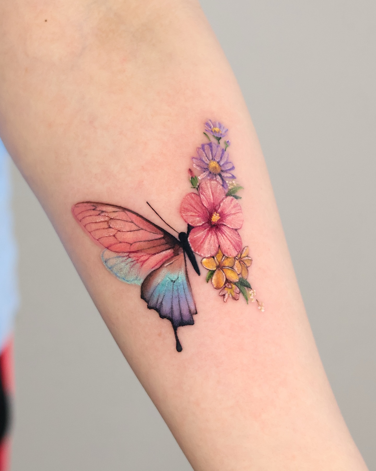 Half Butterfly Half Wildflower Bouquet Tattoo half butterfly half flower tattoos tattoo