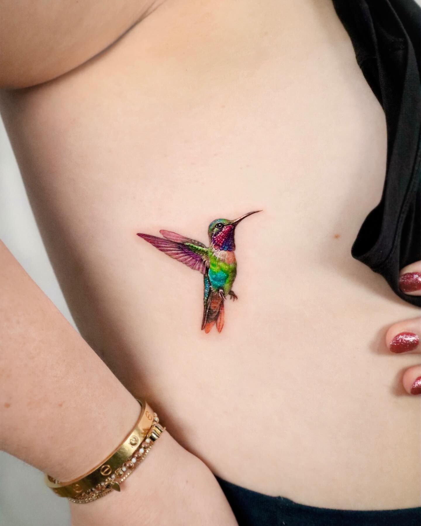 Colorful Realistic Hummingbird Tattoo hummingbird tattoos ideas tattoo