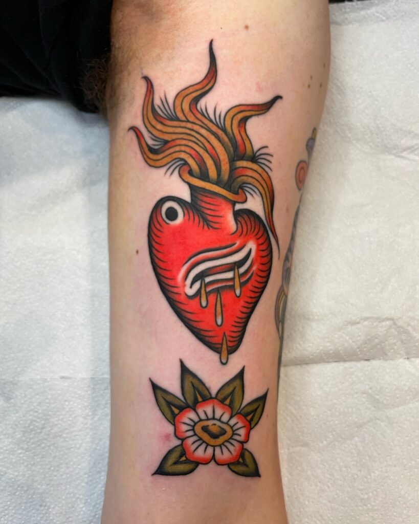Dual Sacred Heart Tattoo with Radiating Light sacred heart tattoo ideas tattoo