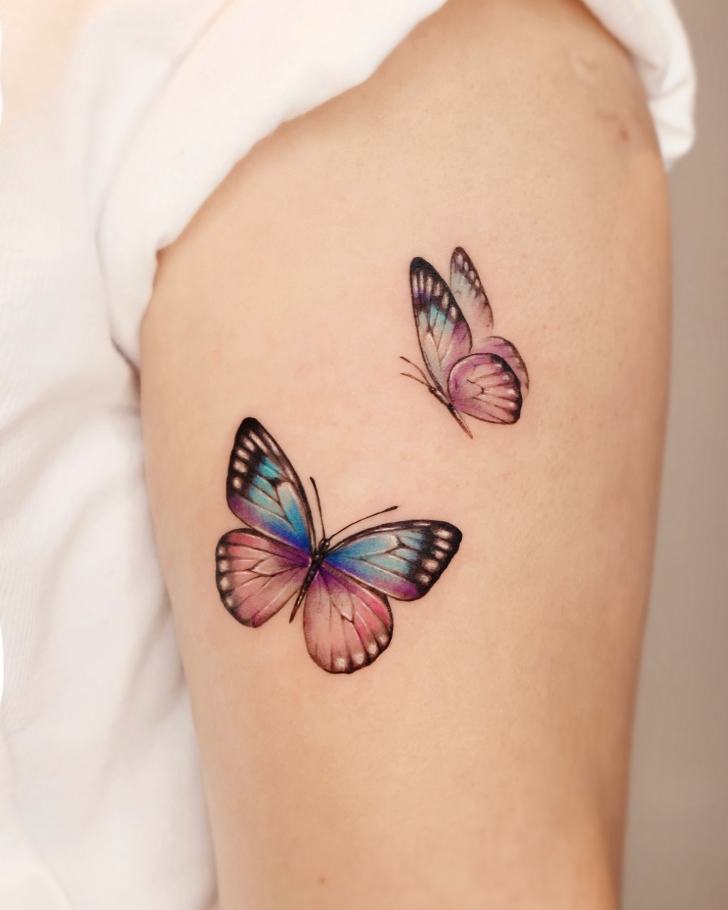 Colorful Two Butterfly Arm Tattoo butterfly tattoos designs tattoo