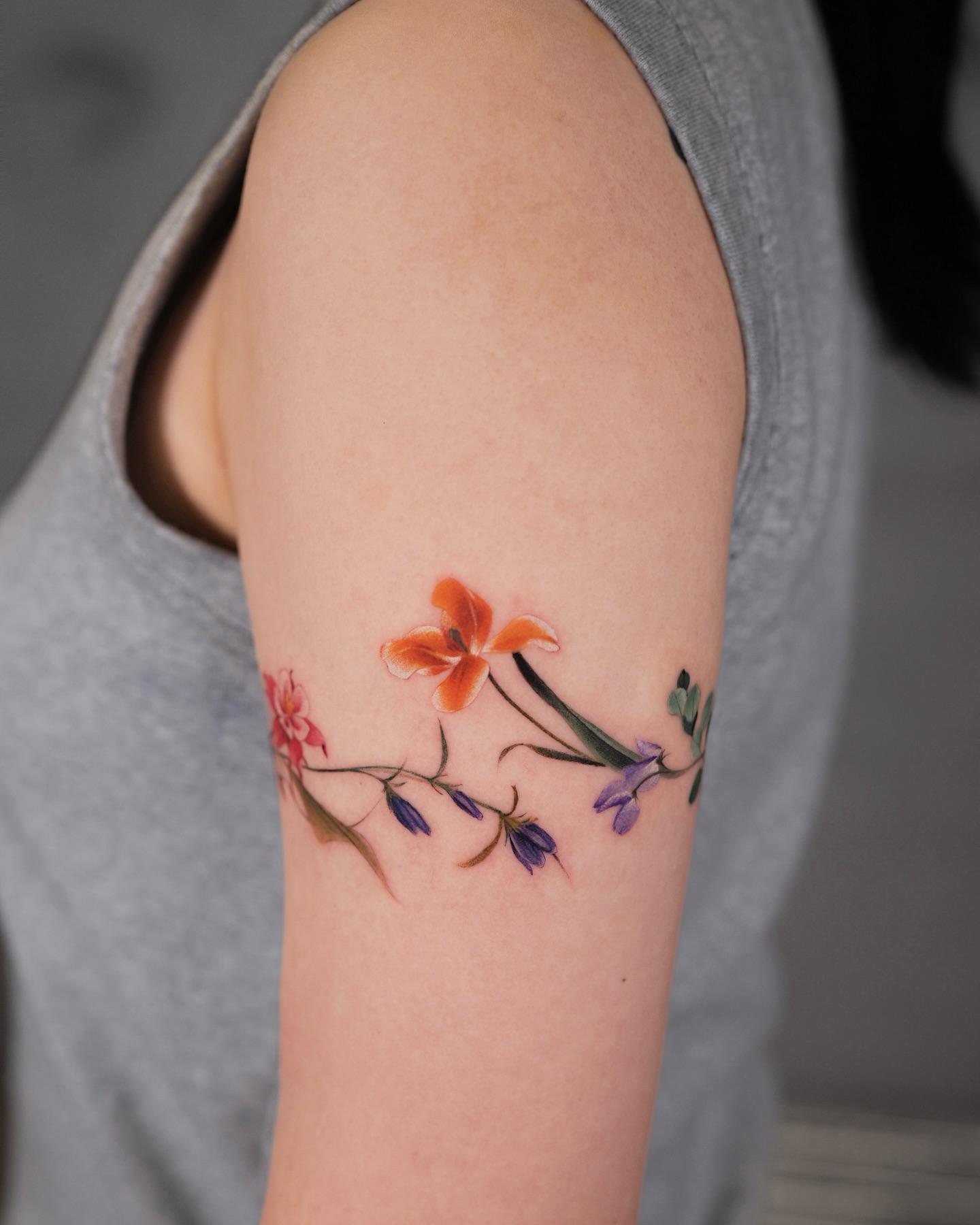 Colorful Wildflower Band Tattoo nature tattoos for women tattoo