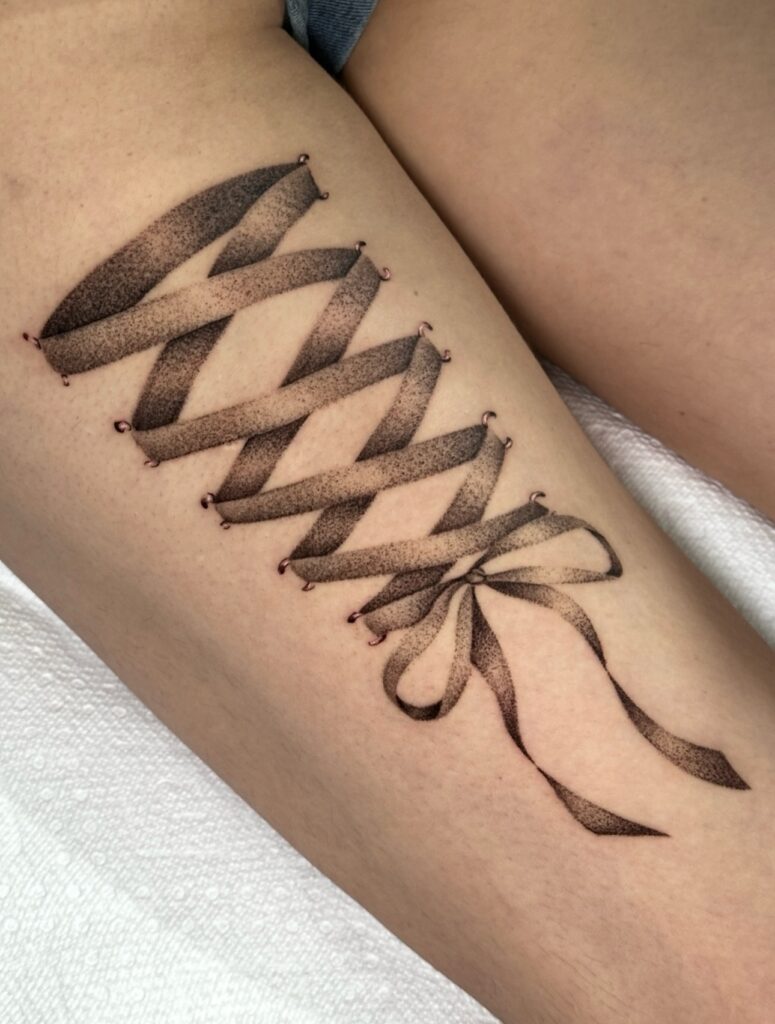 Sun And Moon Upper Arm Tattoo