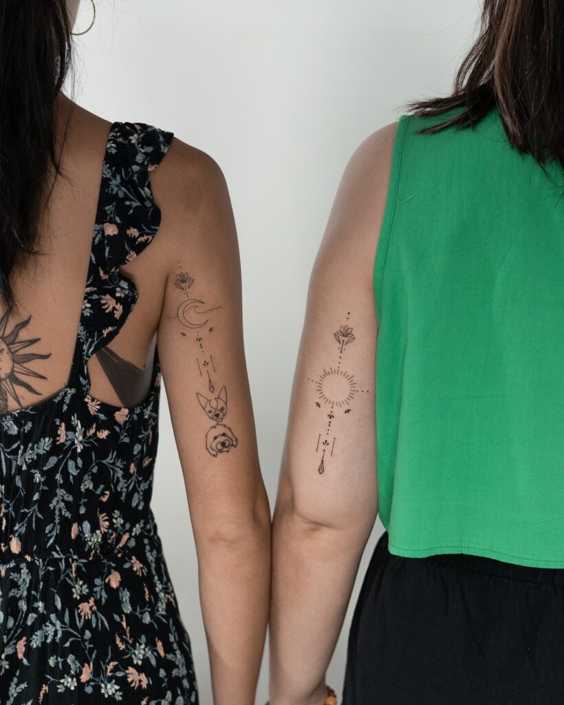 Cosmic & Floral Harmony sisters tattoos tattoo