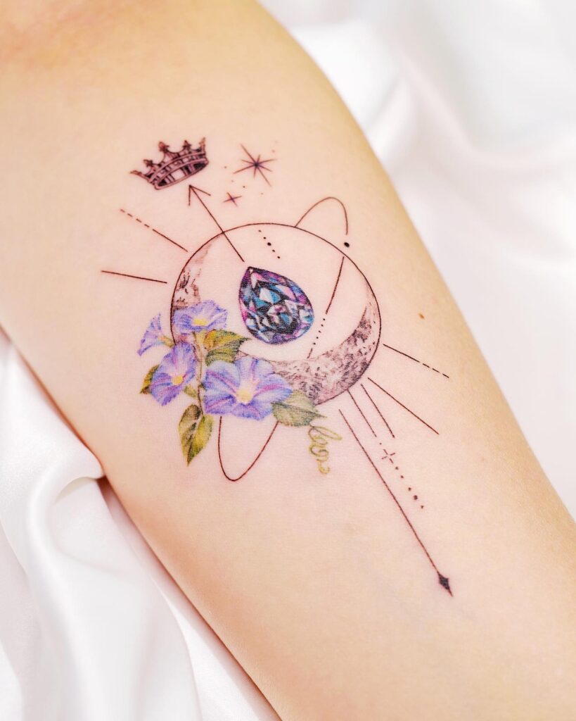 Ornate Ruby And Pearl Brooch Tattoo