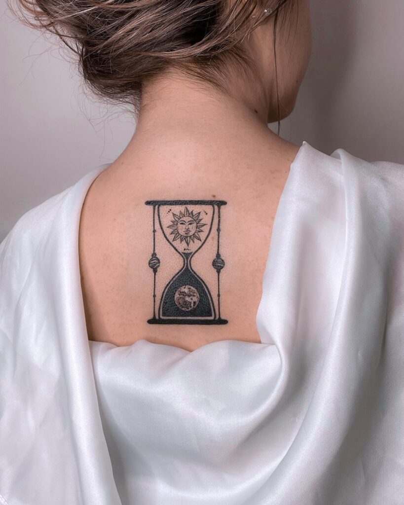 Cosmic Hourglass Back Tattoo hourglass tattoo ideas tattoo