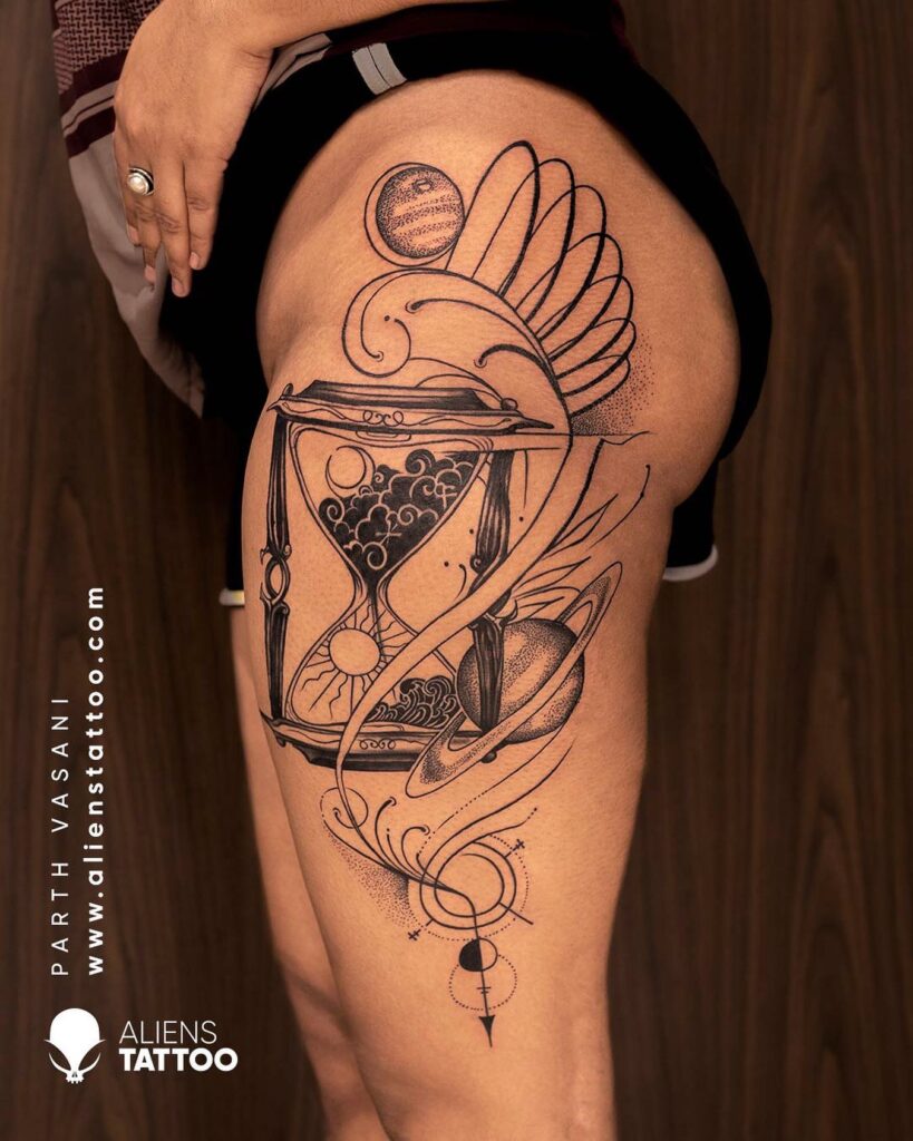 Cosmic Hourglass Thigh Tattoo hourglass tattoo ideas tattoo