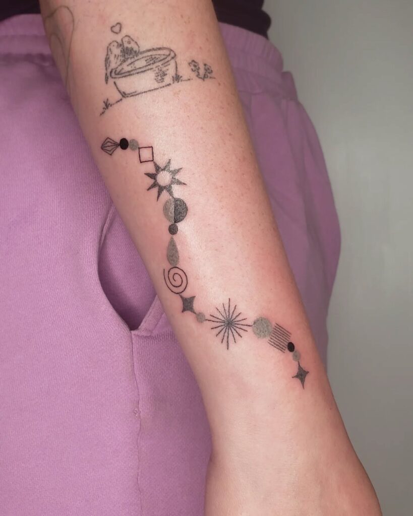 Fragmented Motion Stick And Poke Tattoo