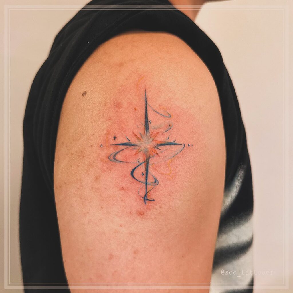 Cosmic Starburst Upper Arm Tattoo
