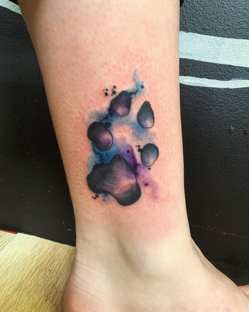 Cosmic Watercolor Paw Print Tattoo paw print tattoo ideas tattoo