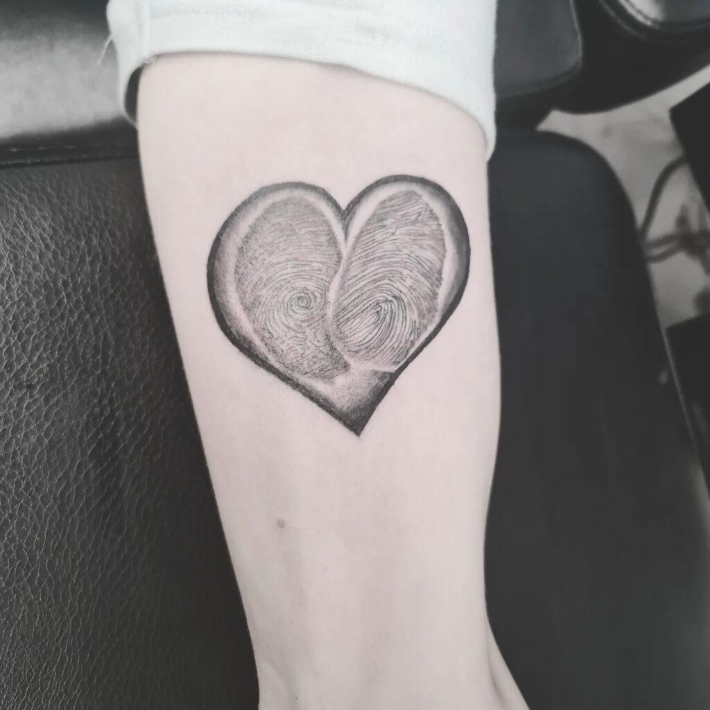 Angel Wings Fingerprint Tattoo with Dates fingerprint tattoos tattoo