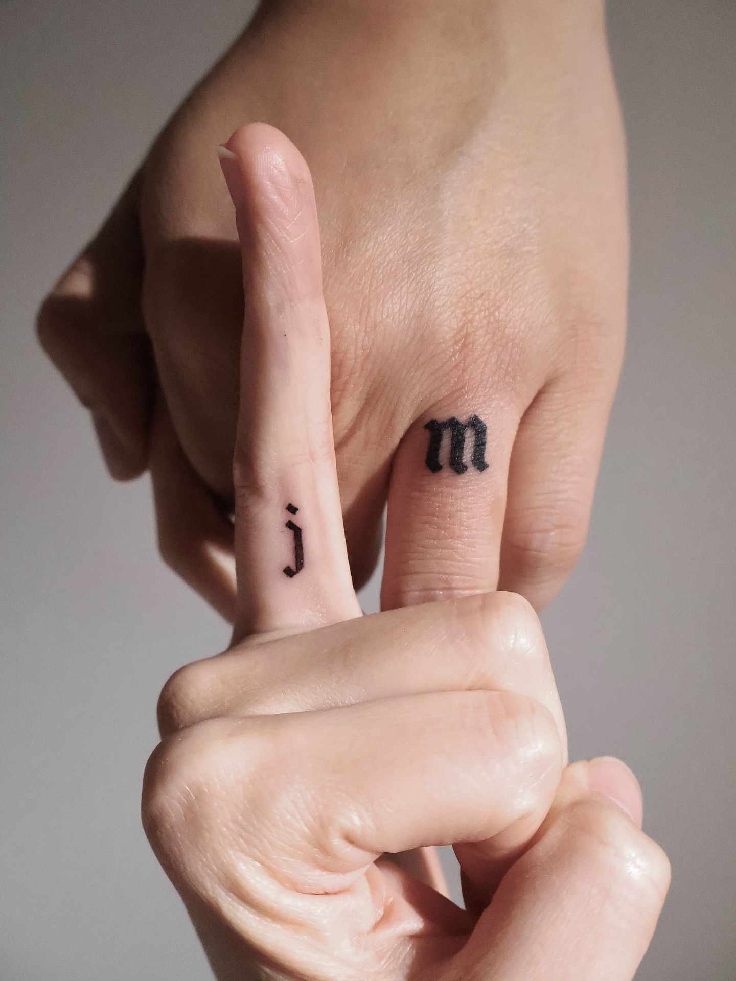 Matching Initial Letter Couples Tattoo