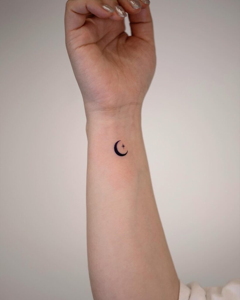 Crescent Moon and Star Wrist Tattoo meaningful tiny tattoos tattoo