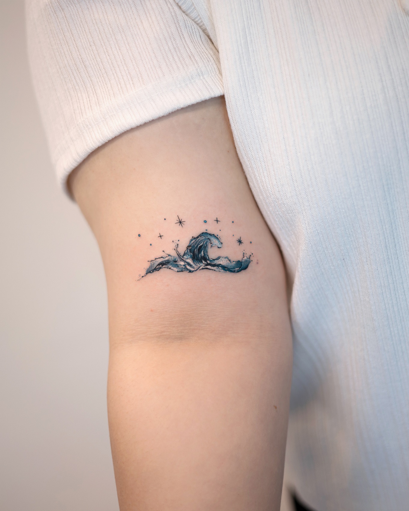 Cresting Ocean Wave and Night Constellation ocean tattoo