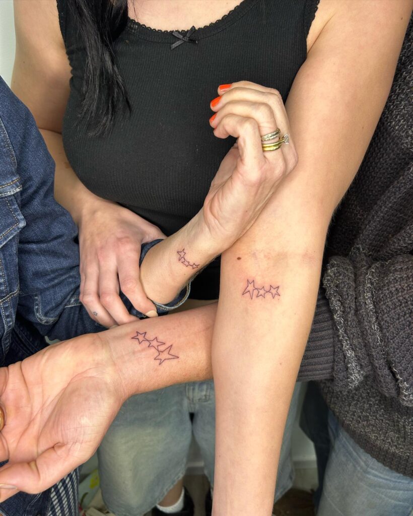 Crisp Four Point Star Outline matching family tattoo