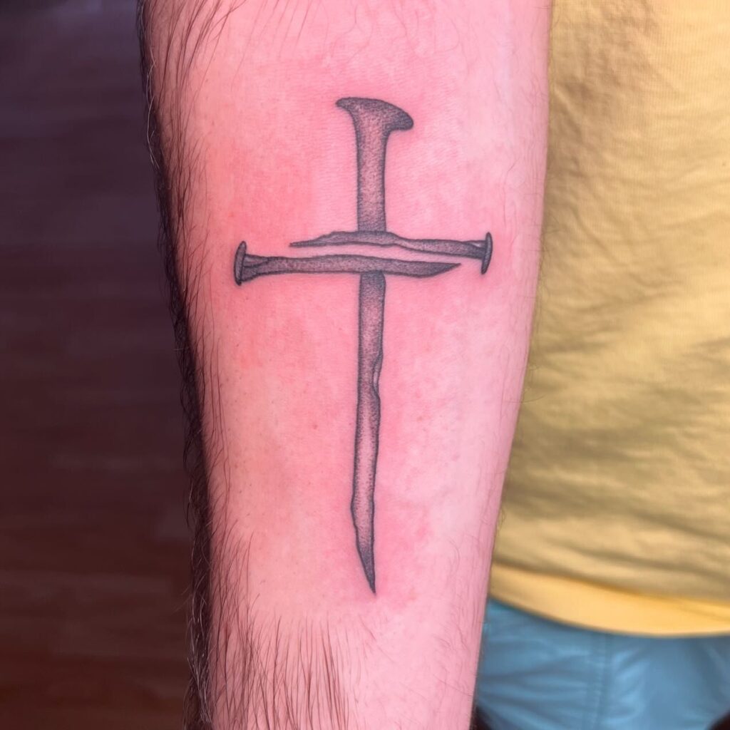 Cross Made of Nails Tattoo cross tattoos for men tattoo