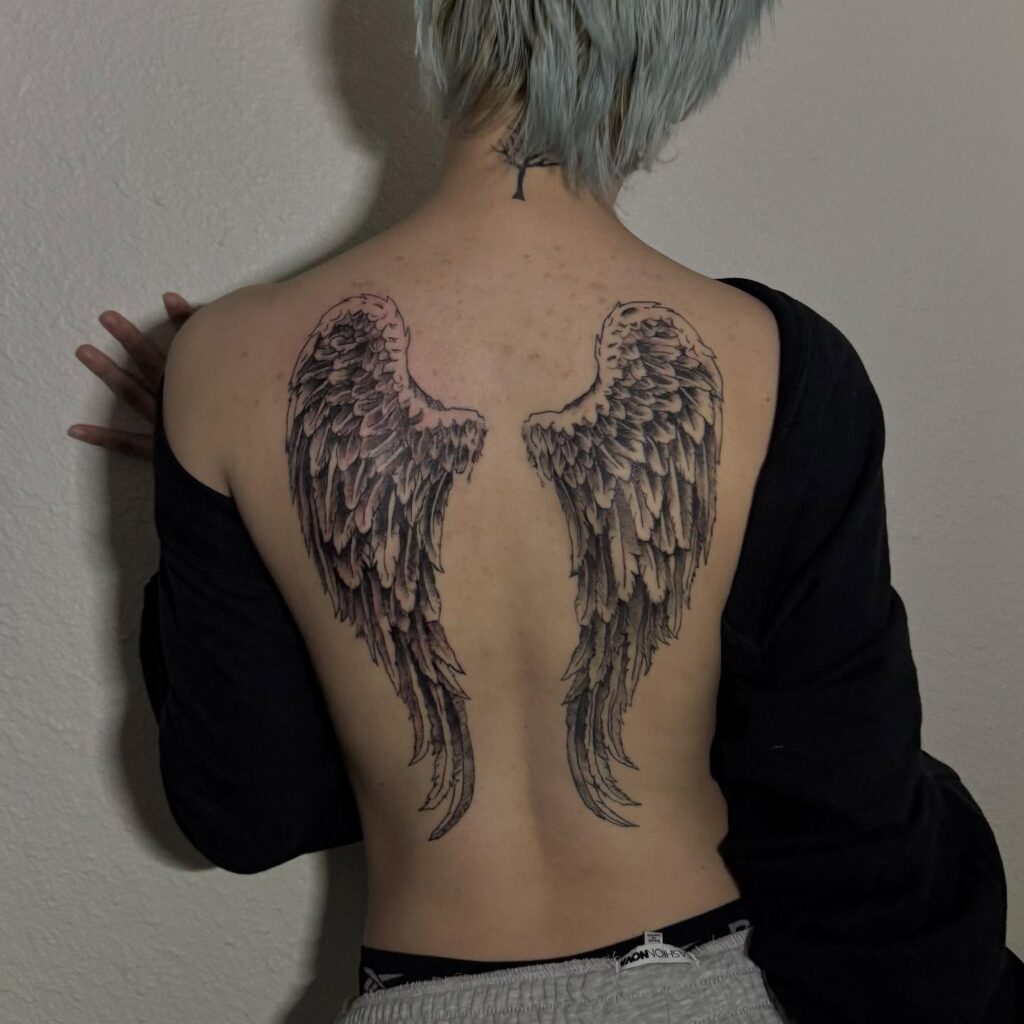 Curved Feathered Angel Wings Tattoo angel wings tattoo ideas on back tattoo
