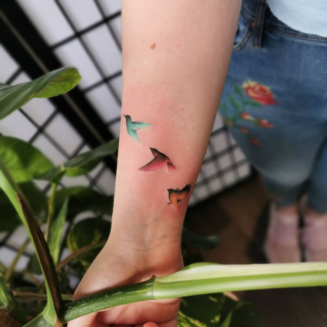 Colorful Flying Birds Tattoo