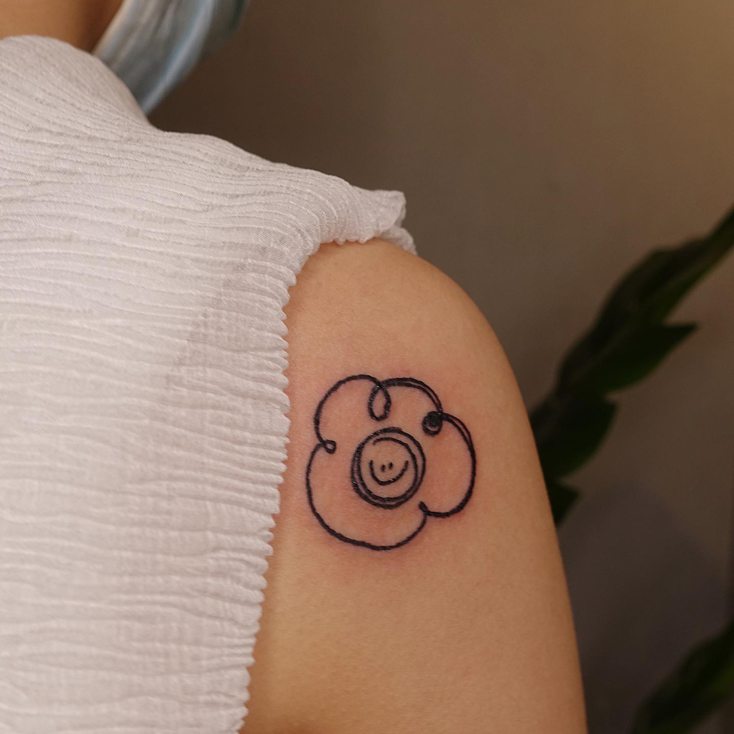 Smiley Flower Tattoo