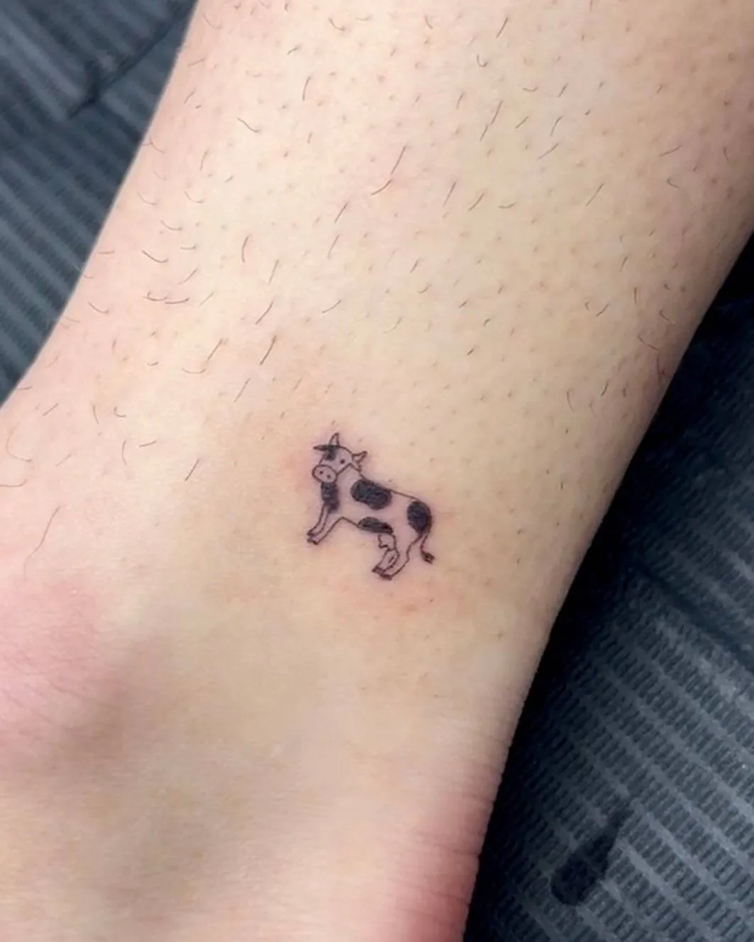 Tiny Cow Tattoo