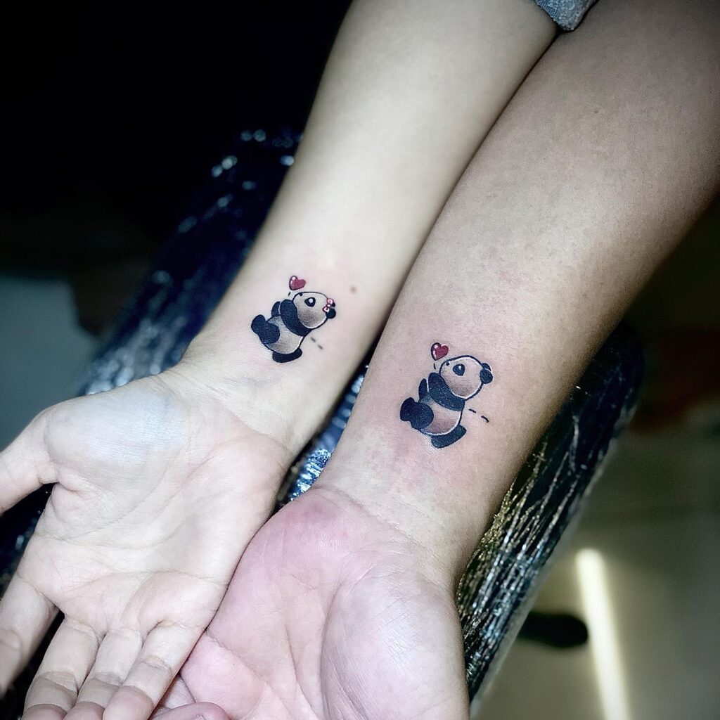 Cute Panda Couple Tattoos with Hearts small couple tattoos tattoo