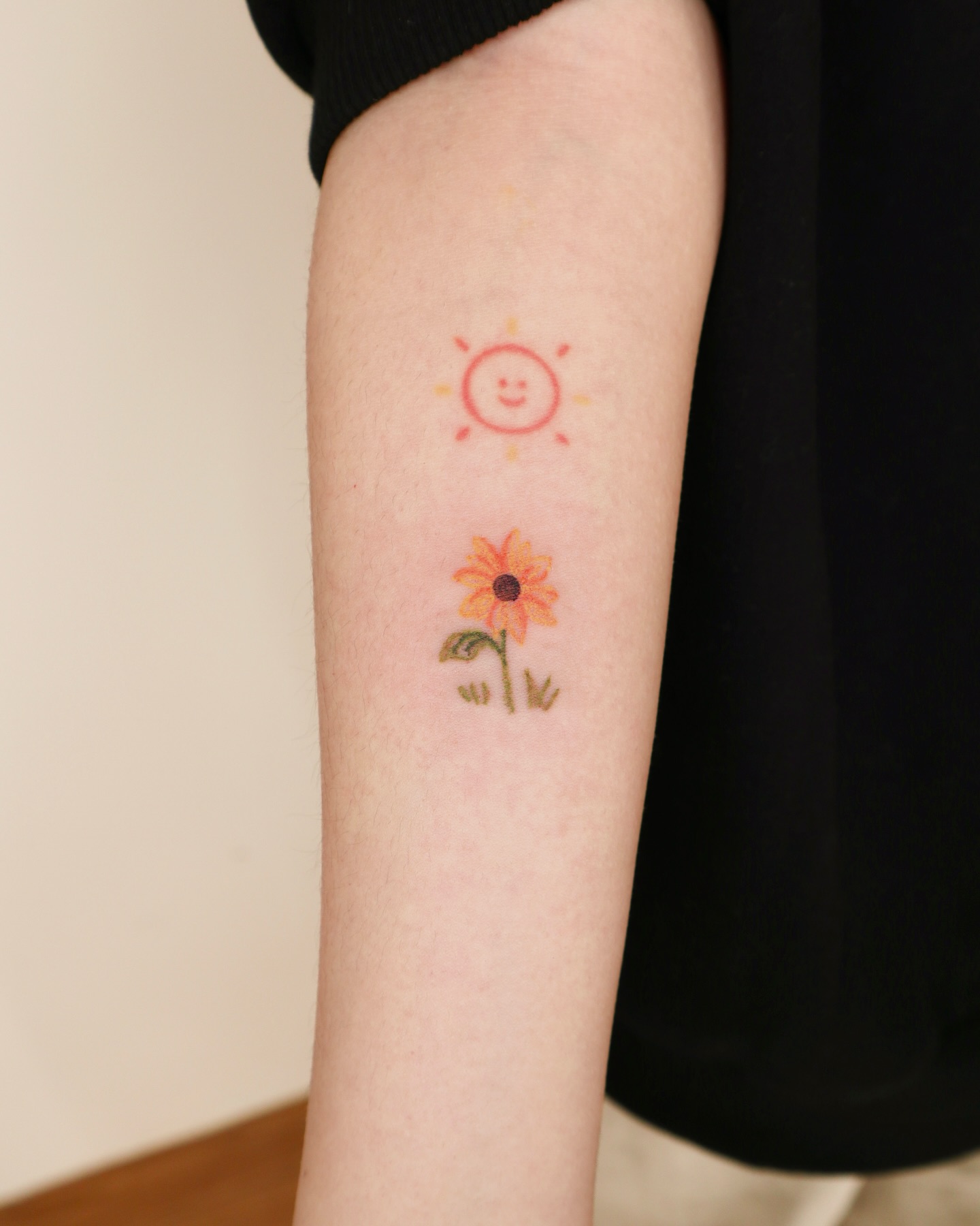 Cute Smiling Sunflower Tattoo small sunflower tattoos ideas tattoo