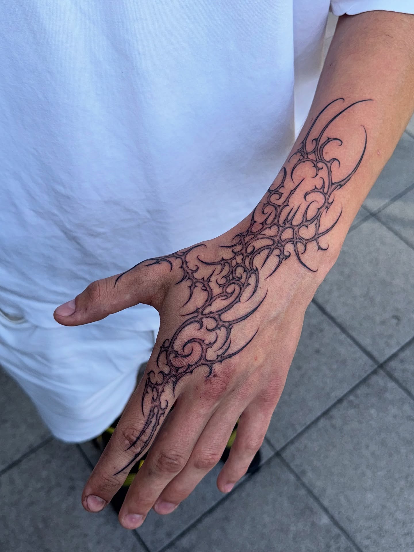 Flowing Ornamental Cybersigilism Hand Tattoo