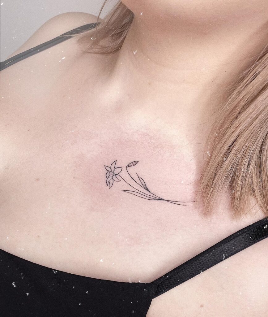 Daffodil Collarbone Tattoo minimal tiny flower tattoo ideas tattoo