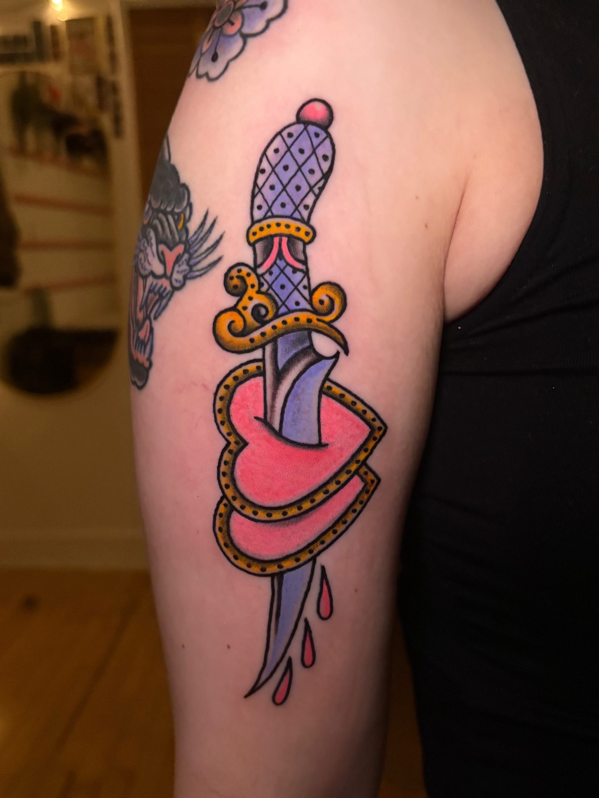 Dagger Through Red Heart Tattoo