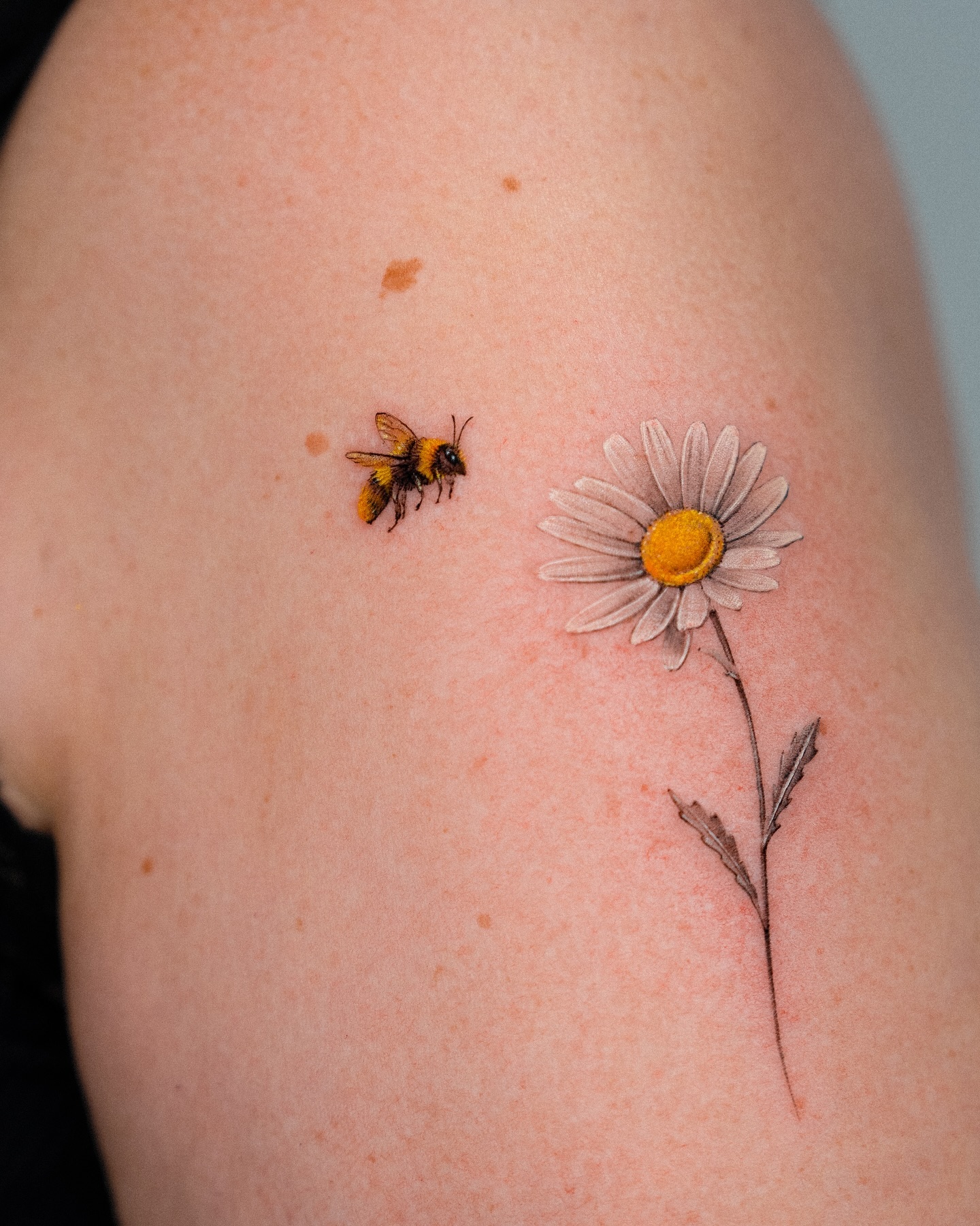 Blue and White Daisy Bouquet Tattoo daisy tattoo ideas tattoo