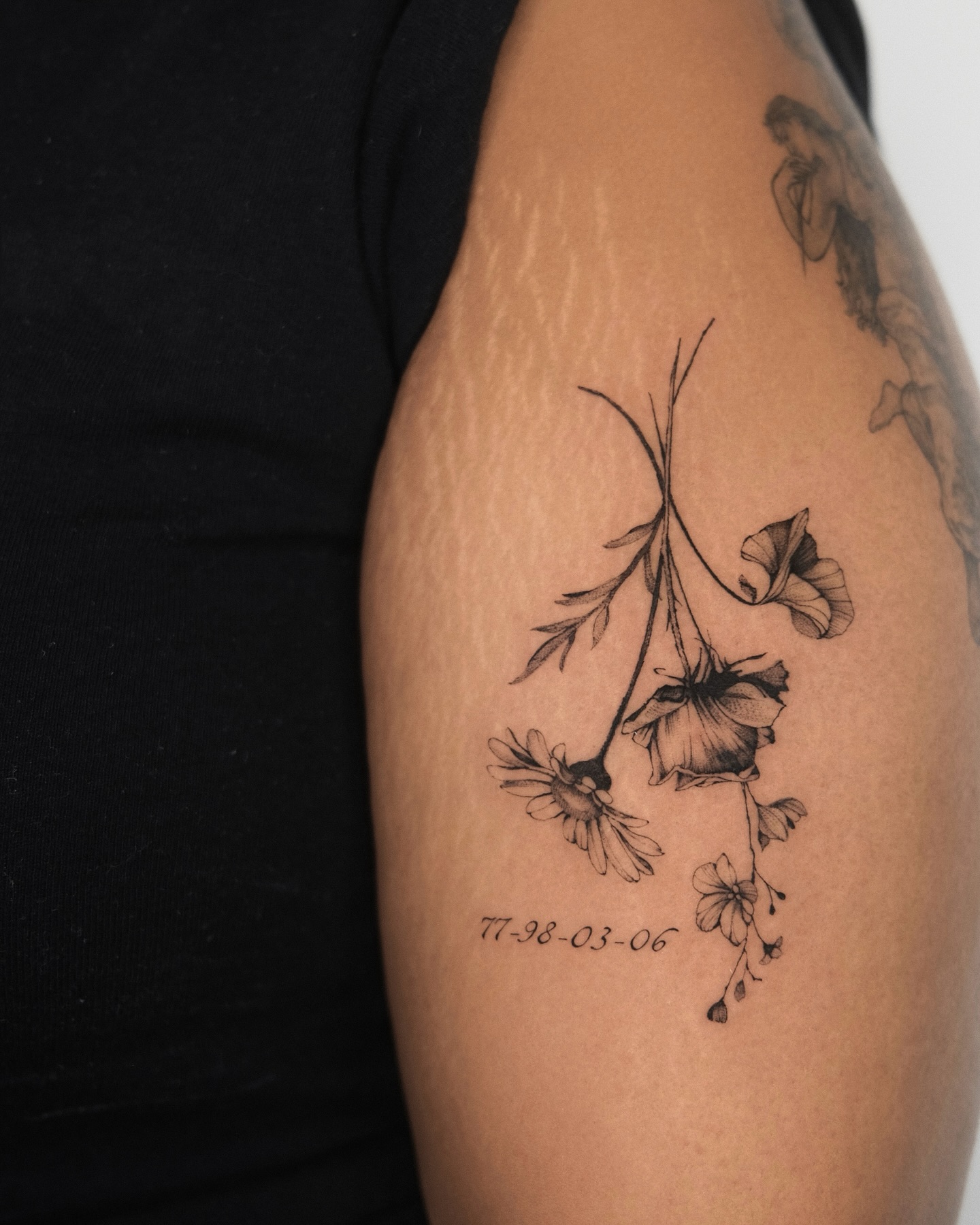 Daisy Tattoo With Ladybug and Water Droplets daisy tattoo ideas tattoo