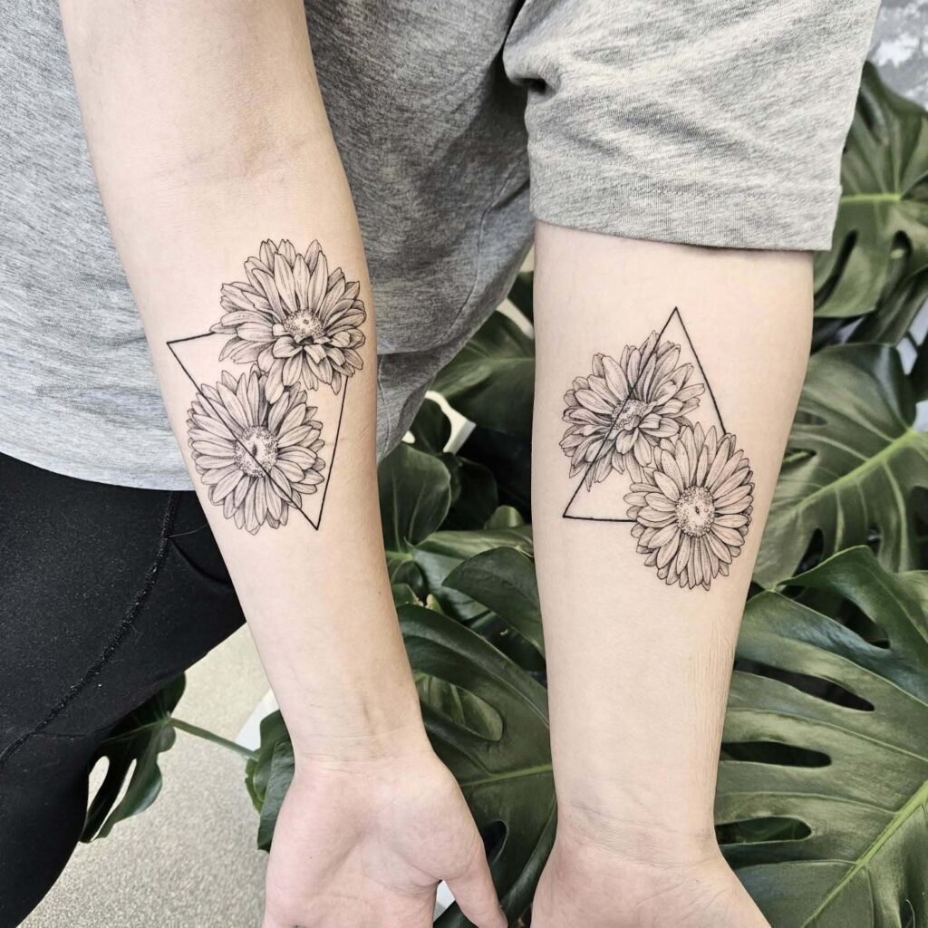 Daisy Blooms with Geometric Triangle matching sibling tattoo