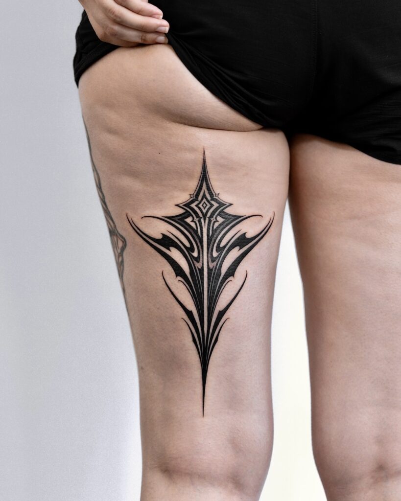 Fluid Ornamental Leg Tattoo