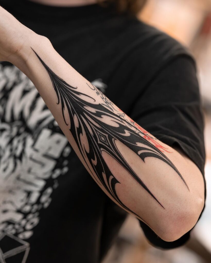 Ornamental Tribal Leg Tattoos