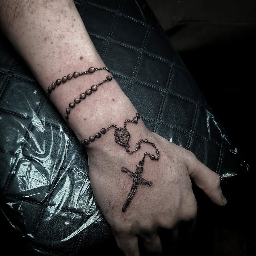 Rosary And Rose Forearm Tattoo