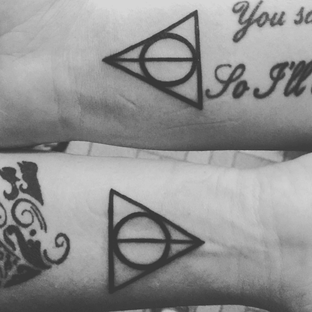 Deathly Hallows Symbol from the Harry Potter Series mom and son tattoo ideas tattoo