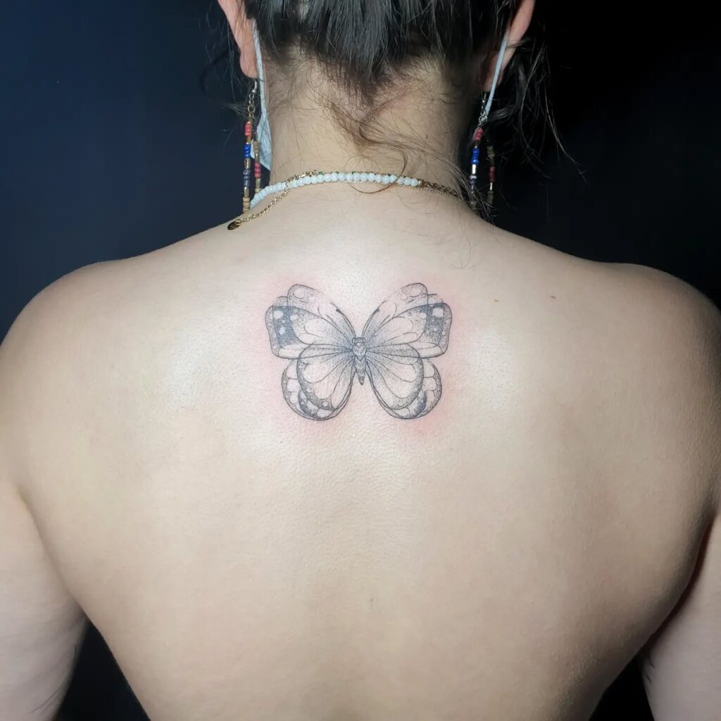 Delicate Back Butterfly Tattoo butterfly tattoo designs tattoo