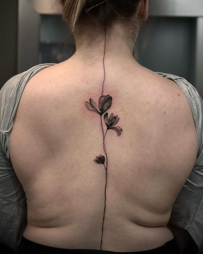 Lunar Floral And Butterfly Spine Tattoo