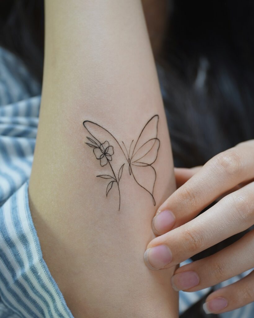 Delicate Blue Tinted Wing Butterfly butterfly tattoo
