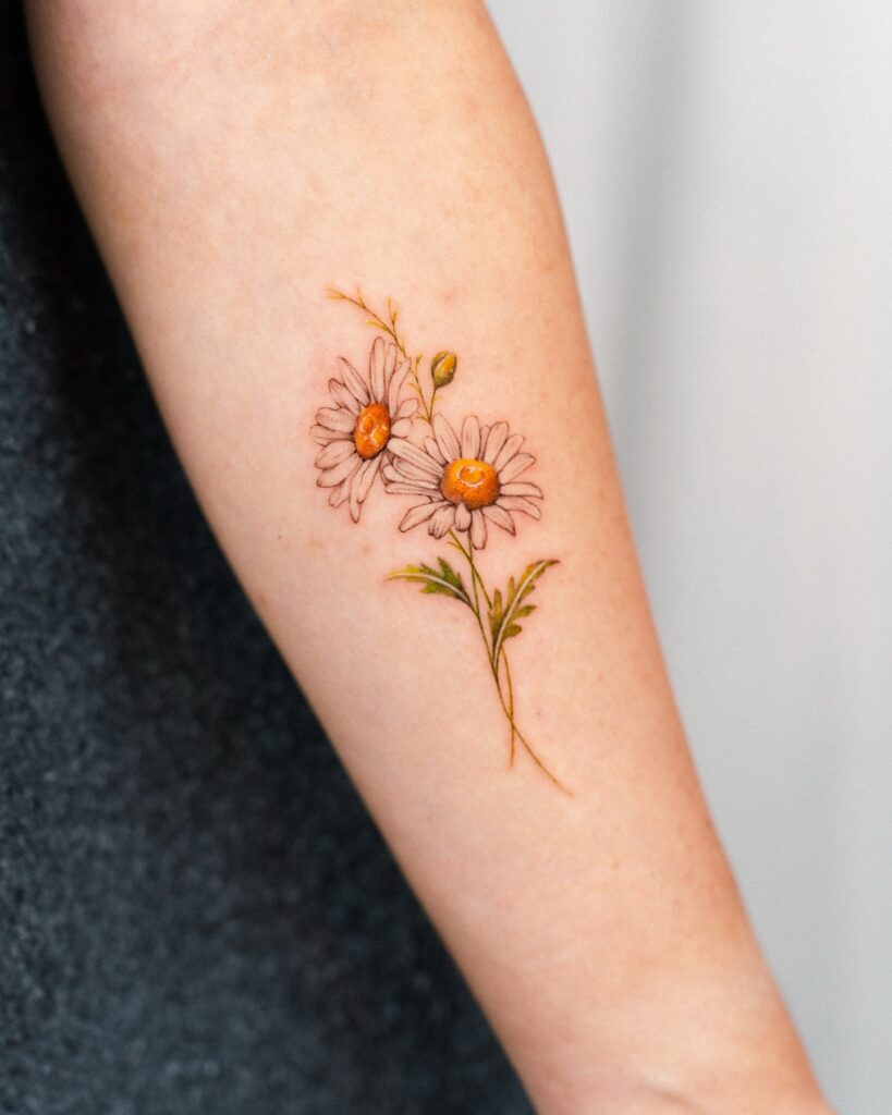 Delicate Daisy Forearm Tattoo april birth flower tattoo ideas tattoo