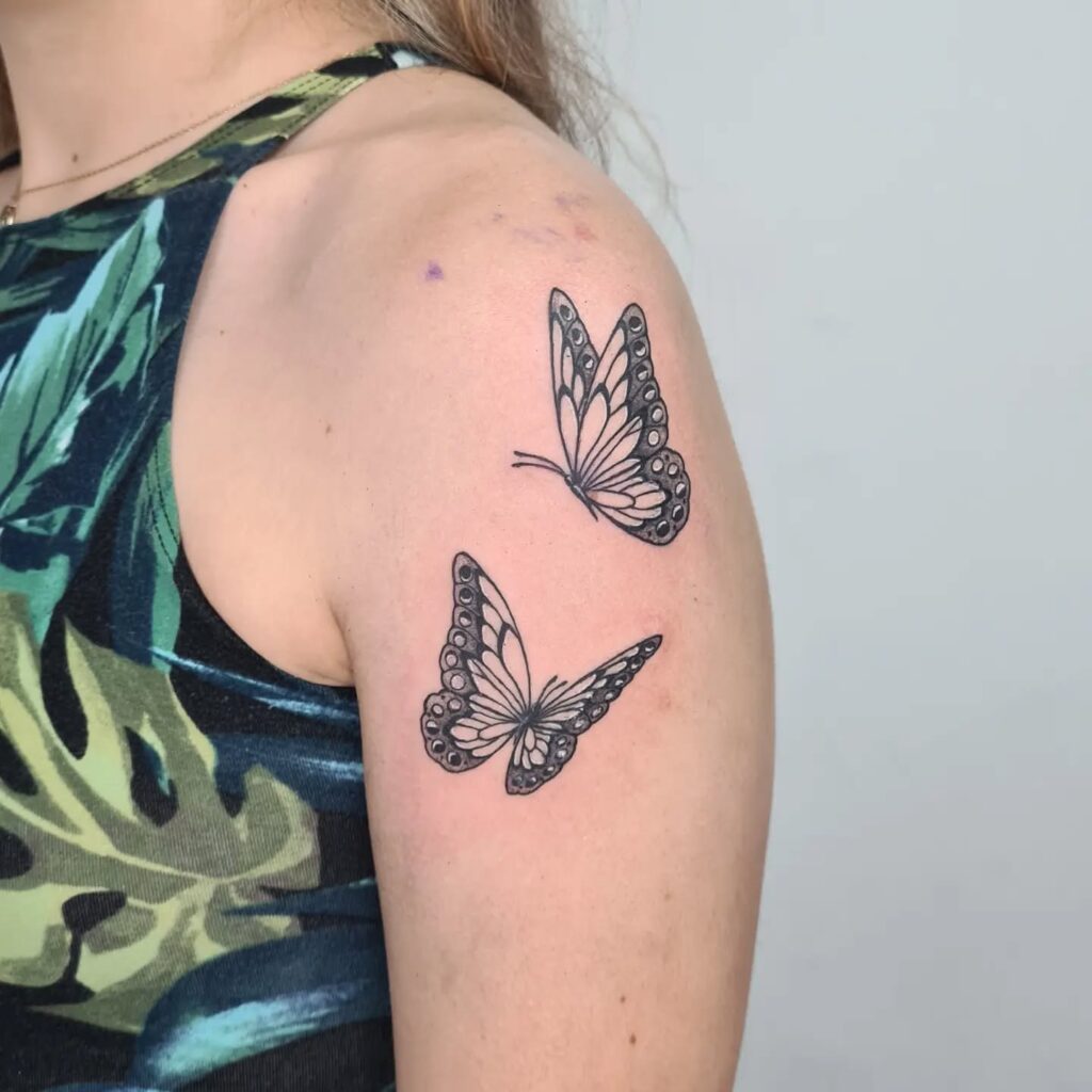 Flowing Serpent Upper Arm Tattoo