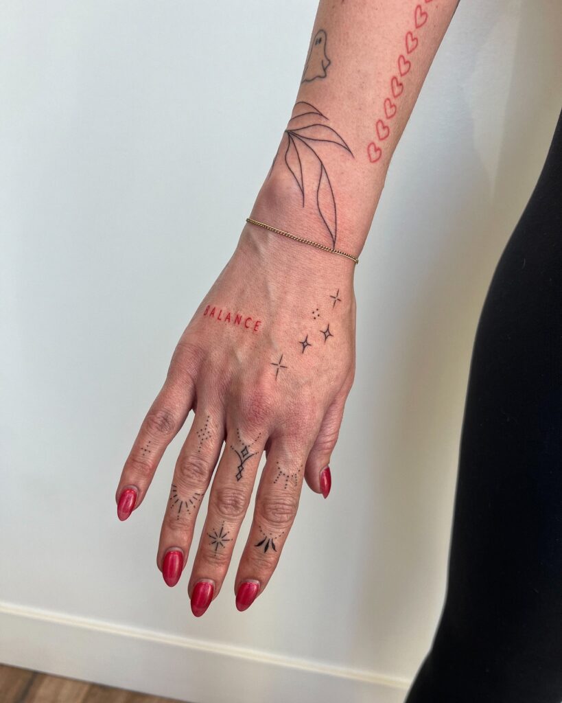 Minimalist Dotwork And Geometric Hand Tattoo