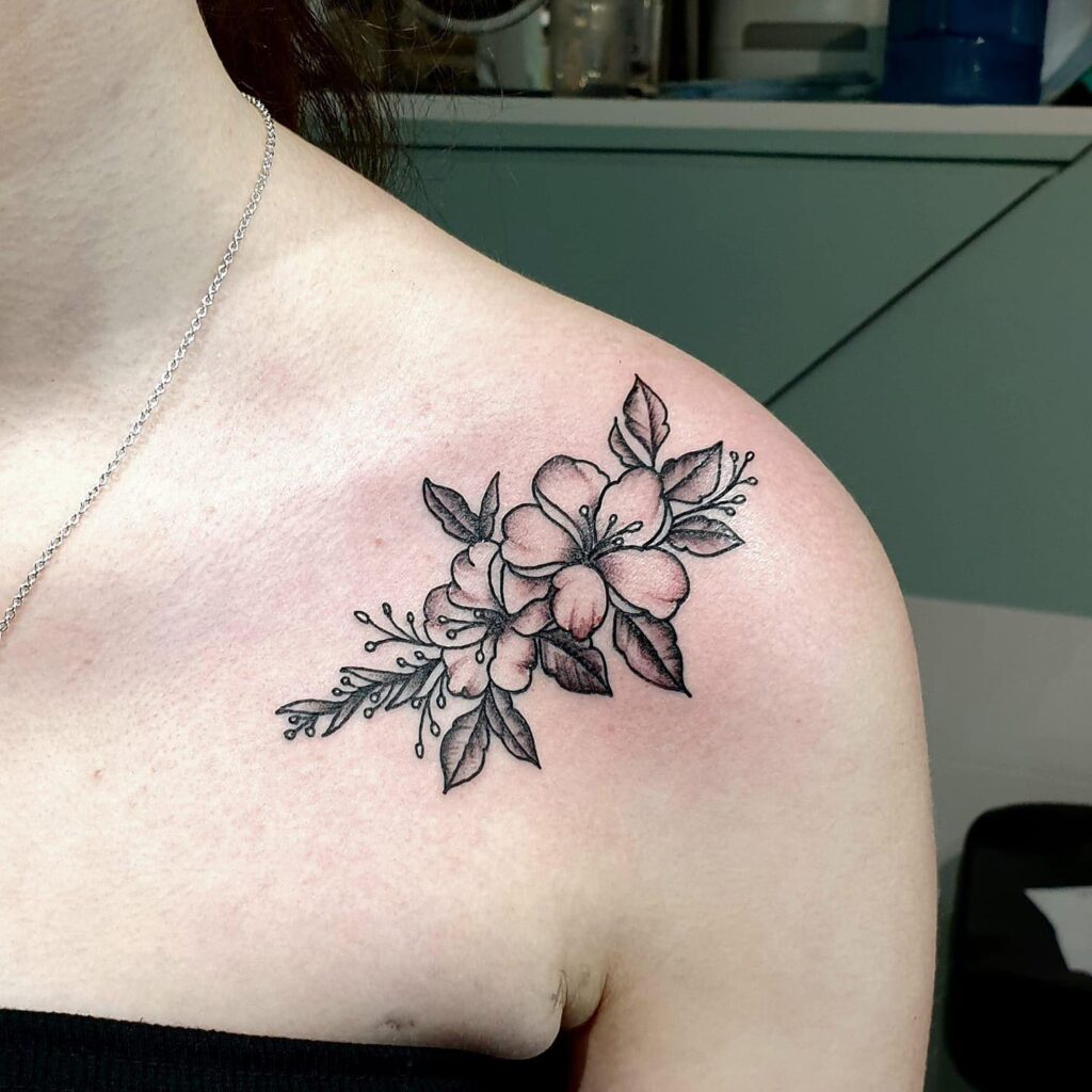 Delicate Hibiscus Shoulder Tattoo women shoulder flower tattoo ideas tattoo