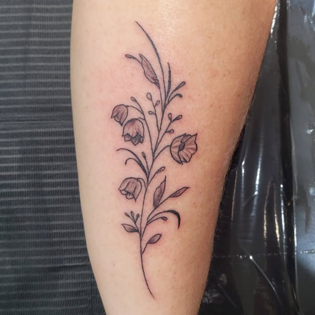 Delicate Lily of the Valley Hand Tattoo may birth flower tattoos tattoo