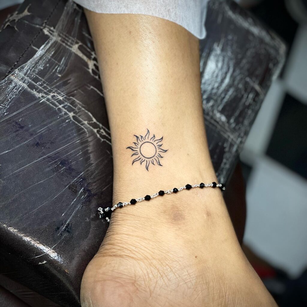 Delicate Sun Ankle Tattoo sun tattoos tattoo
