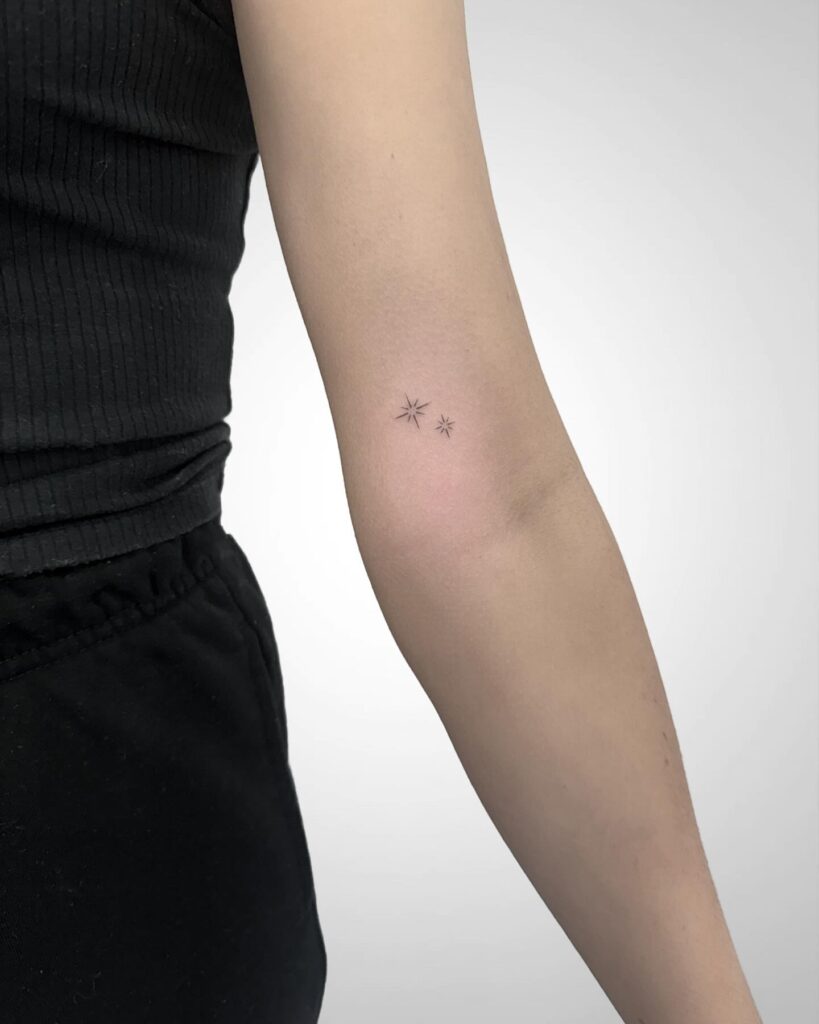 Tiny Red Star Wrist Tattoo