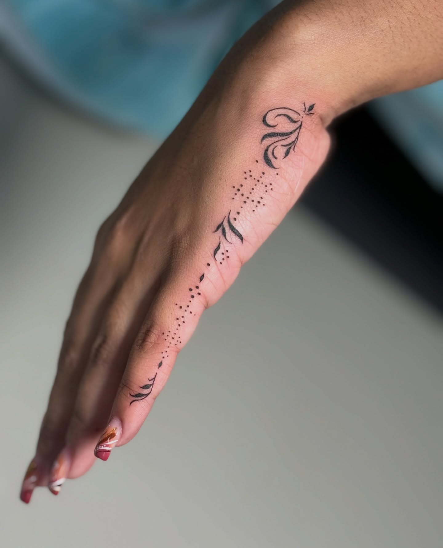Sun And Moon Face Hand Tattoo