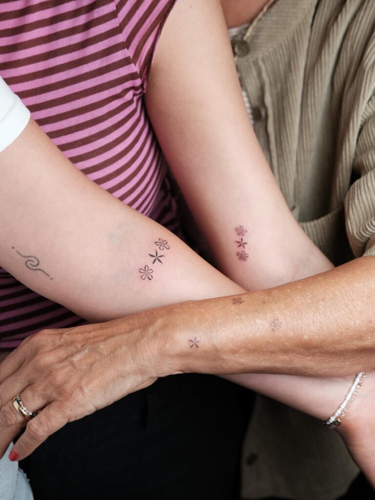 Delicate Wildflower Stems in Tandem matching family tattoo