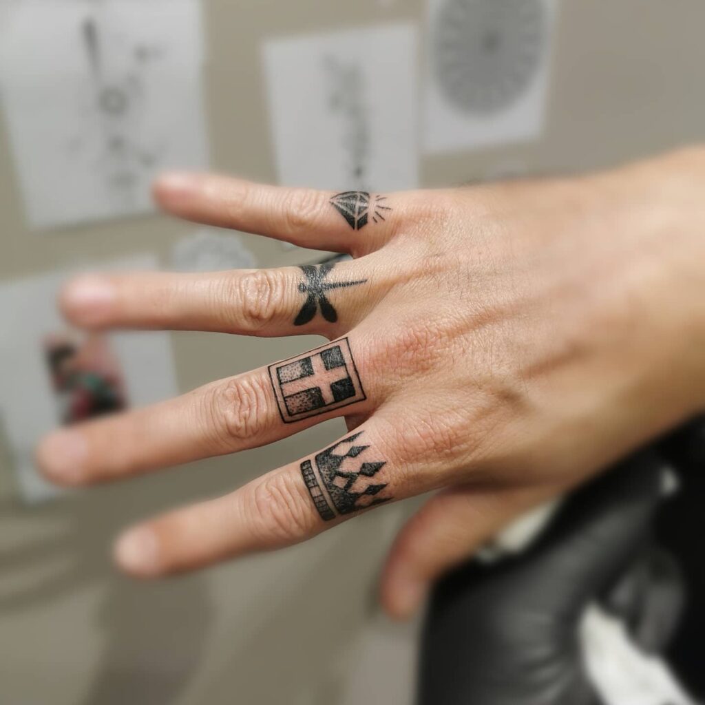 Matching Blue Rose Finger Tattoos